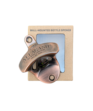 Brass wall-mounted bottle opener with 'Allagash Brewing Company' branding