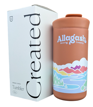 A red travel mug with Colorful Allagash Logo next to the box