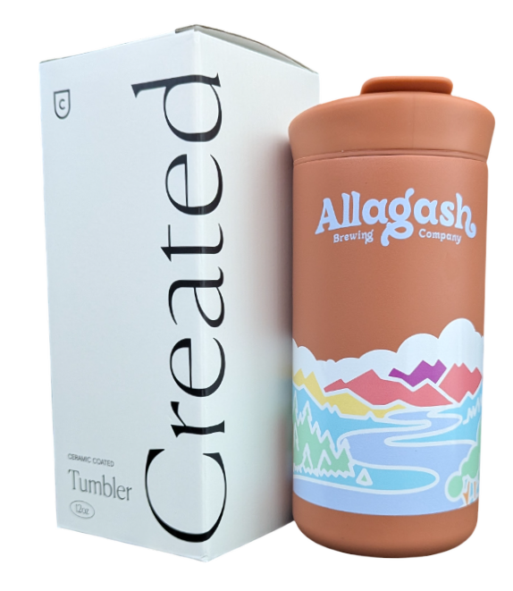 A red travel mug with Colorful Allagash Logo next to the box