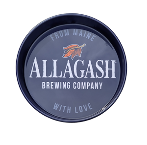 A blue beer tray with an Allagash logo in white, colorful leaf and the words From Maine With Love in light blue.