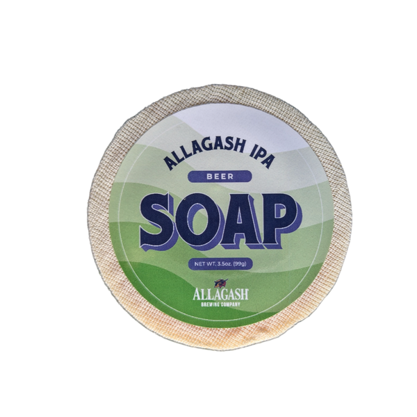 A round bar of soap with a green label