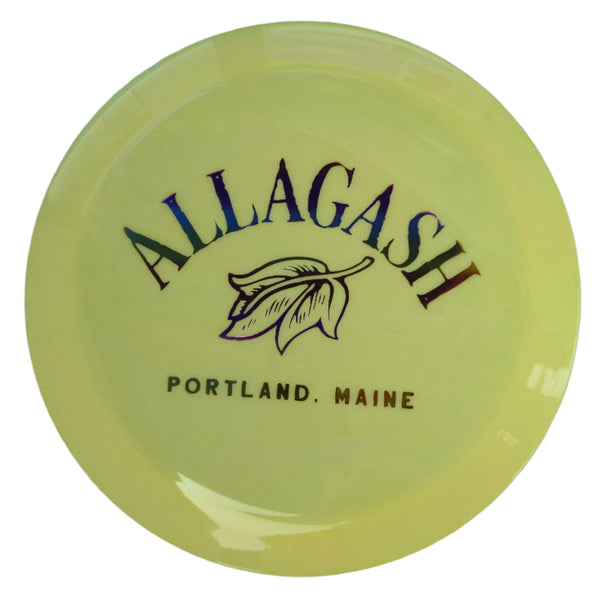 Yellow disc with multicolor text 'Allagash, Portland Maine' and leaf logo.