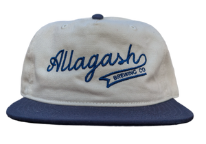 A white Allagash baseball cap with blue text on the front.