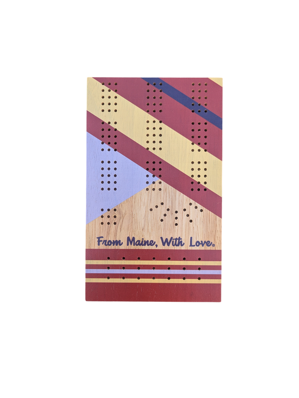 Wooden cribbage board with geometric design on a white background