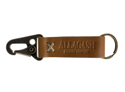 A brown leather keychain with a metal ring and snap hook, featuring an embossed logo that reads 'Allagash Brewing Company'.