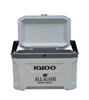 An Igloo marine cooler with the Allagash Brewing Company logo on the front, featuring a gray handle, a white body, and a lid that is partially open.