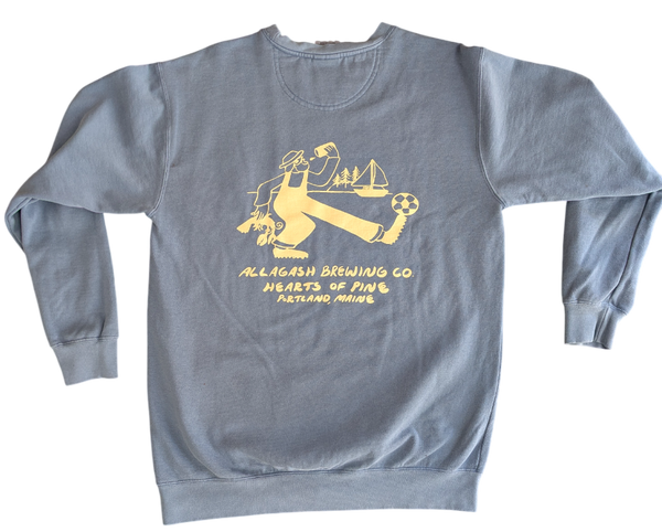 Light blue sweatshirt with yellow Maine and soccer themed graphic. Yellow text "Allagash Brewing Co. Hearts of Pine Portland, Maine"