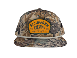 Camouflage cap with Allagash Brewing logo on a white background