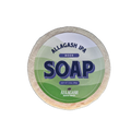 A round bar of soap with a green label